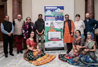 Ten participants of the Hindi Day by an advertising stand of e-Hindi platform